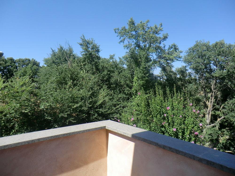 Il Casaletto Dei Ludi Aparthotel Aranova Bagian luar foto