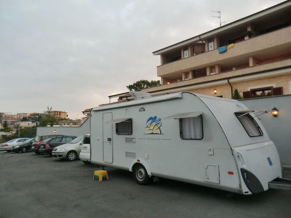 Il Casaletto Dei Ludi Aparthotel Aranova Bagian luar foto