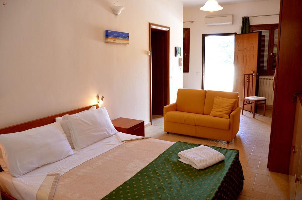 Il Casaletto Dei Ludi Aparthotel Aranova Bagian luar foto