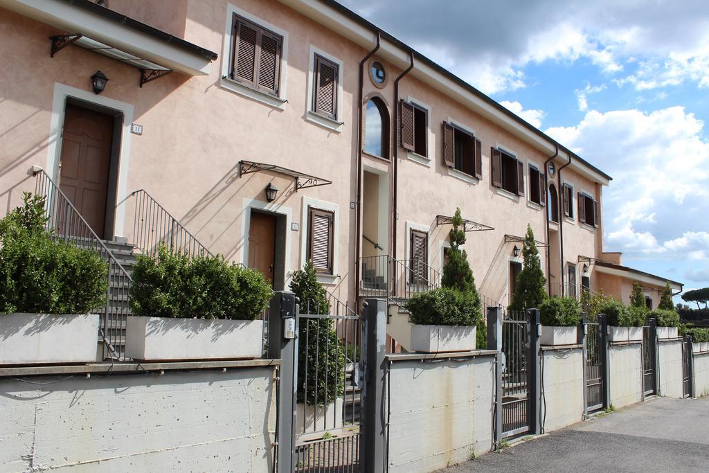 Il Casaletto Dei Ludi Aparthotel Aranova Bagian luar foto