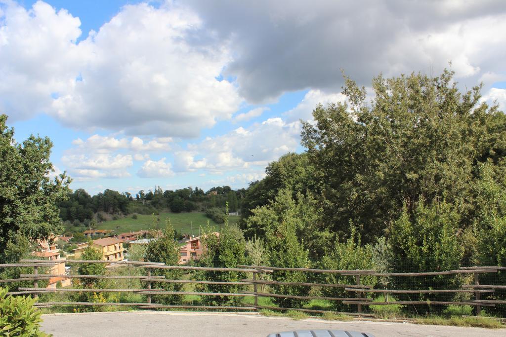Il Casaletto Dei Ludi Aparthotel Aranova Bagian luar foto