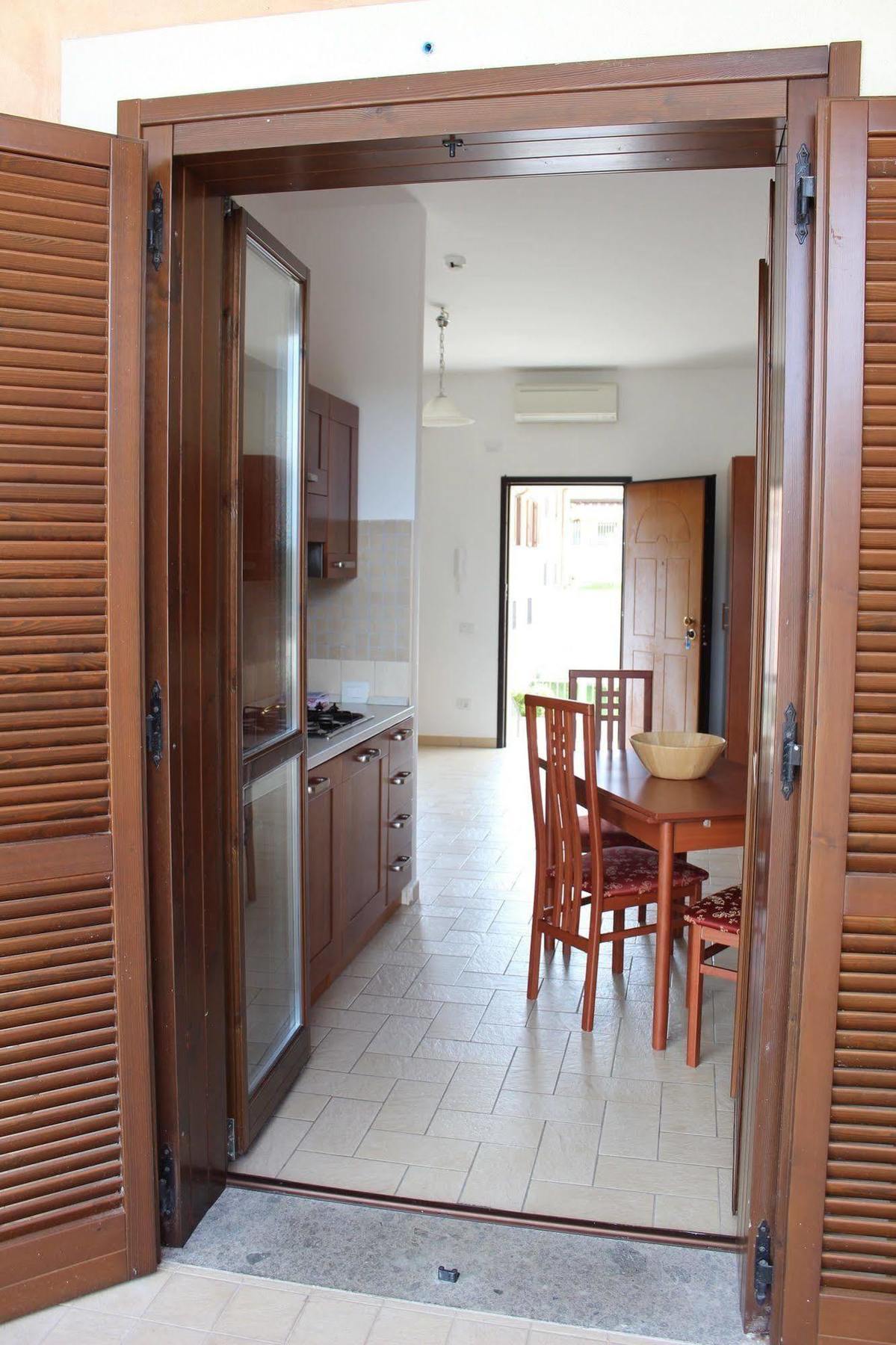 Il Casaletto Dei Ludi Aparthotel Aranova Bagian luar foto