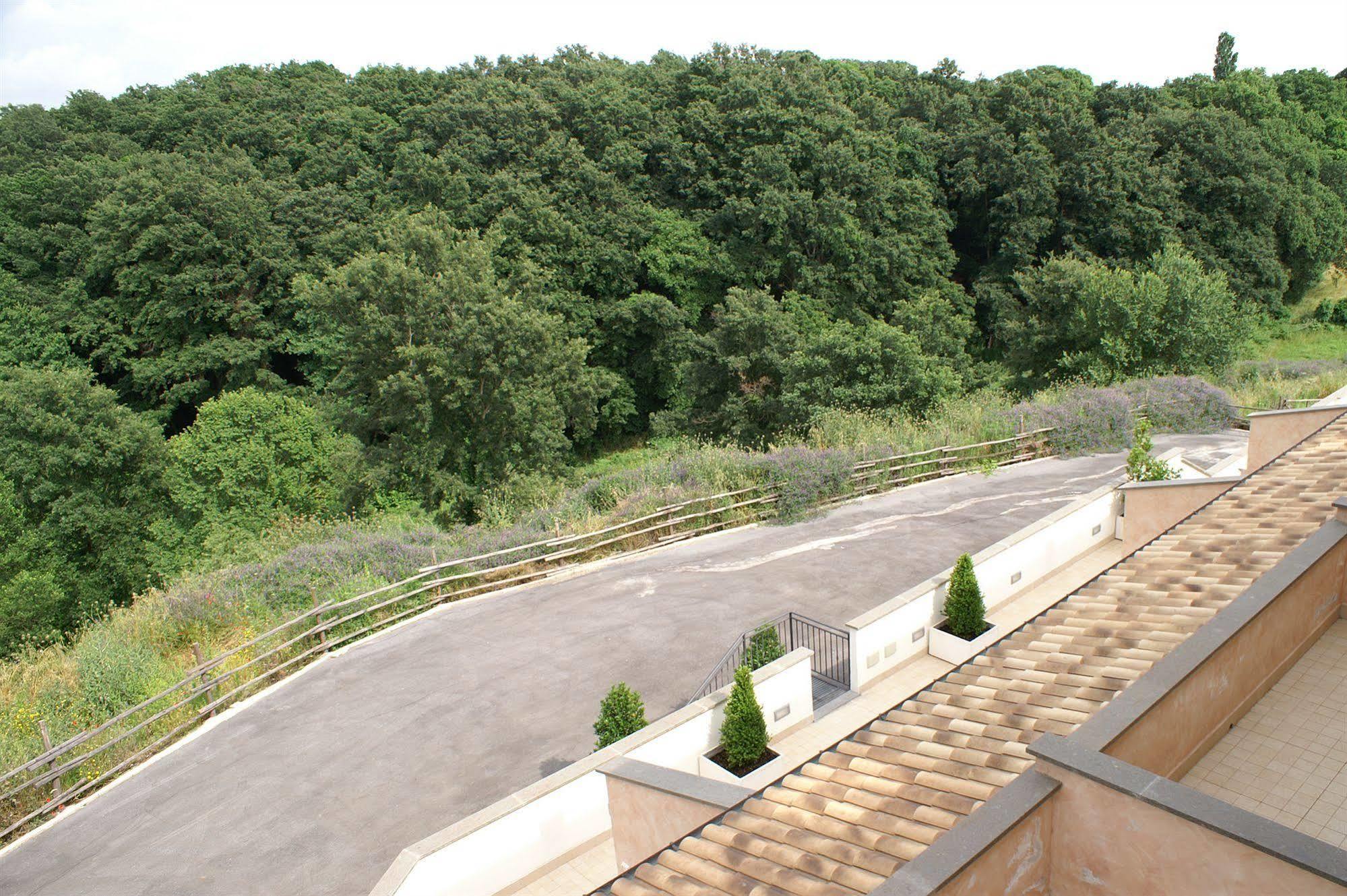 Il Casaletto Dei Ludi Aparthotel Aranova Bagian luar foto