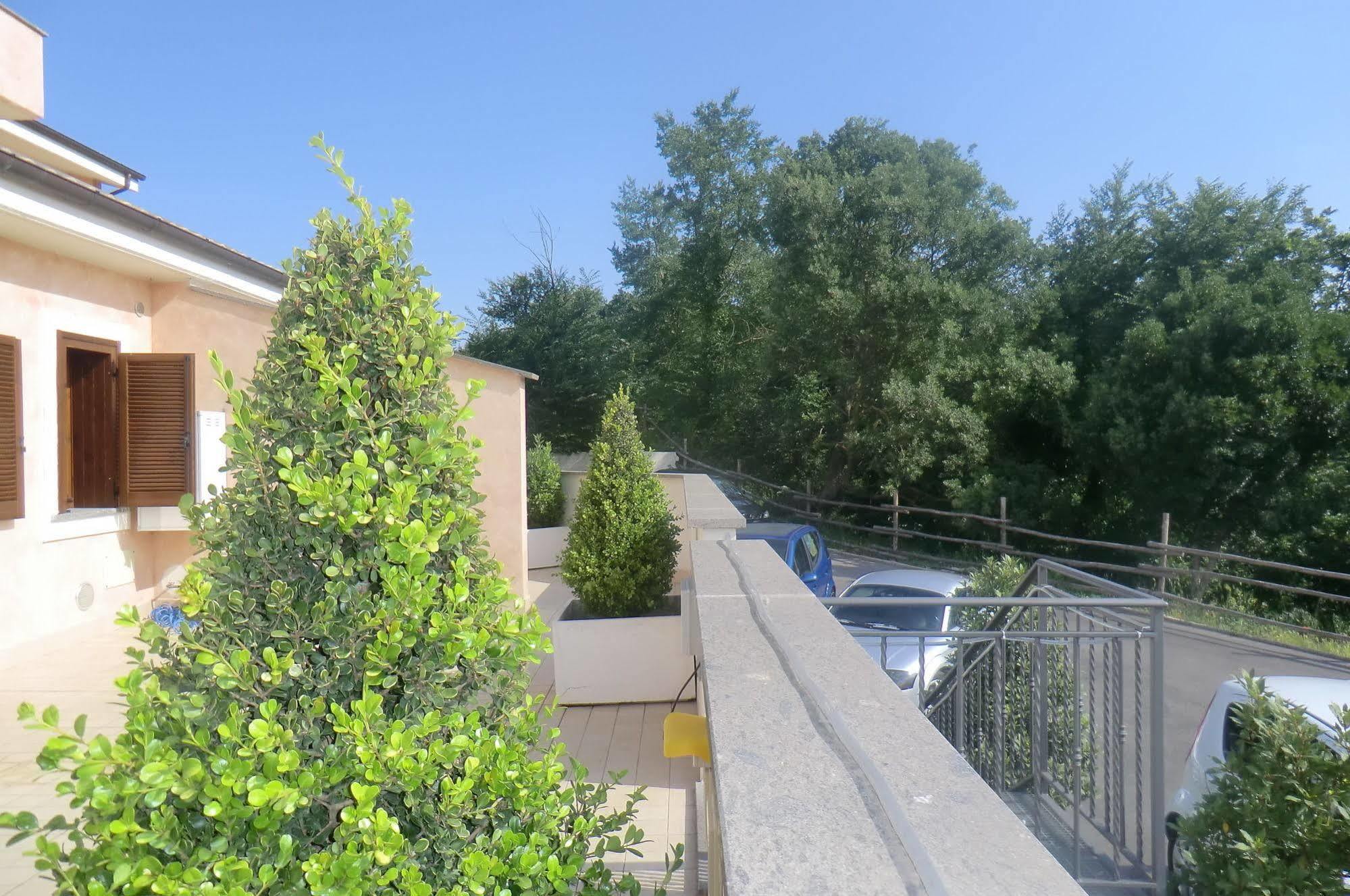 Il Casaletto Dei Ludi Aparthotel Aranova Bagian luar foto